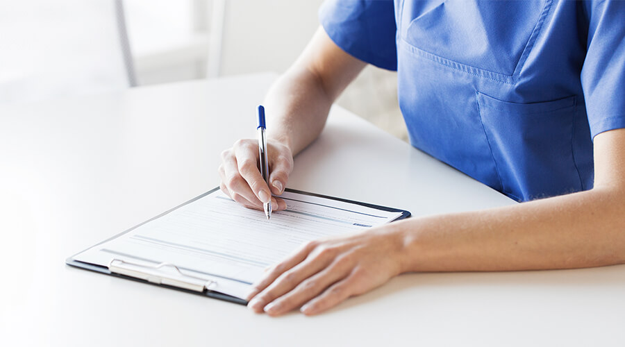 Nurse Writing Notes