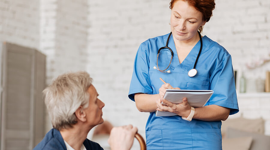 Nurse Talking To Patient
