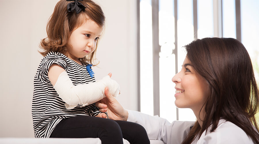 Nurse With Little Girl
