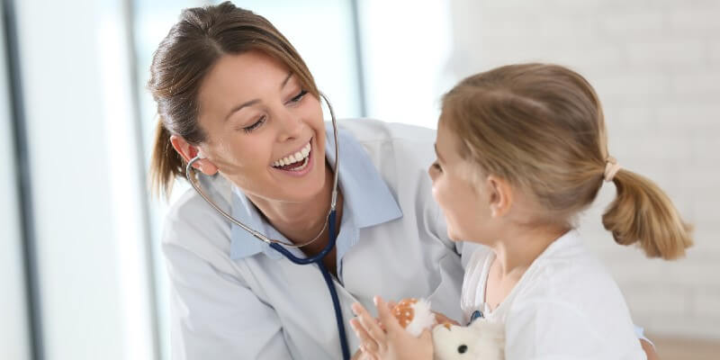 nurse with young girl