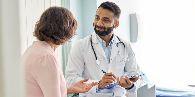 Doctor Helping Patient