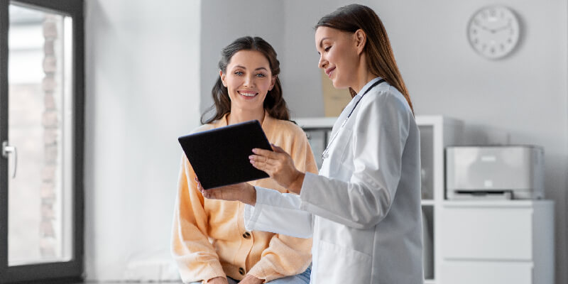 Locum Nurse Assisting Patient